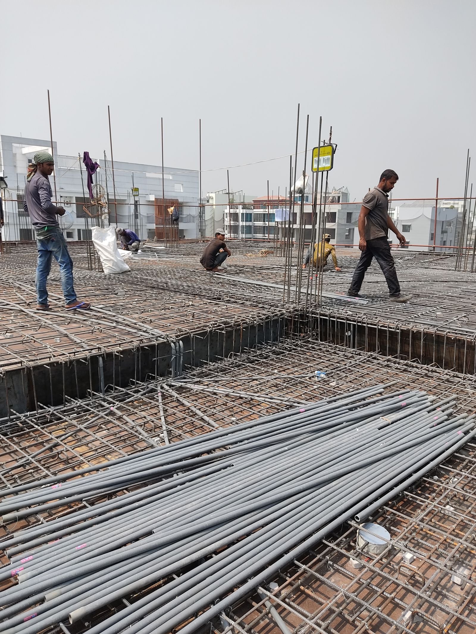 Reinforcing steel laid out on a foundation before a concrete pour